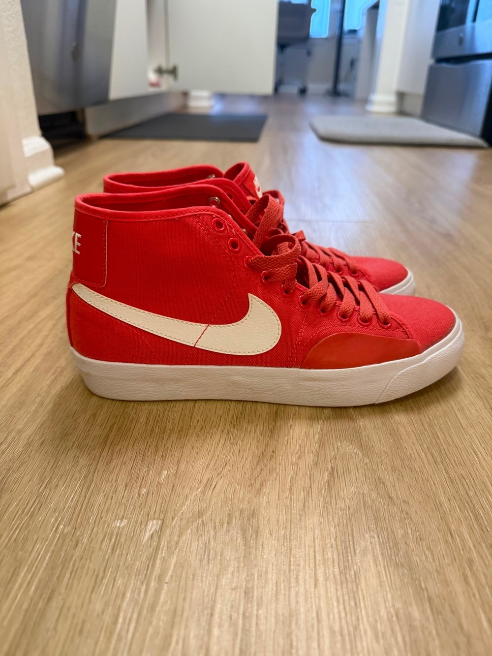 Nike Red Mid-Top Canvas Sneakers with White Swoosh
